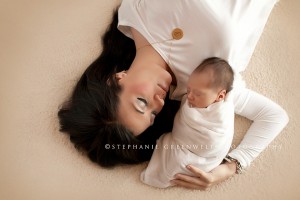 mother and son newborn baby wrapped vintage mom and child stephanie greenwell